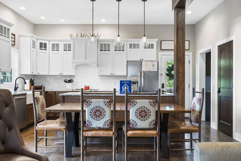 Interior Of A Kitchen With Dining Area In A Vacation Rental Interior Of A Kitchen With Dining Area In A Vacation Rental