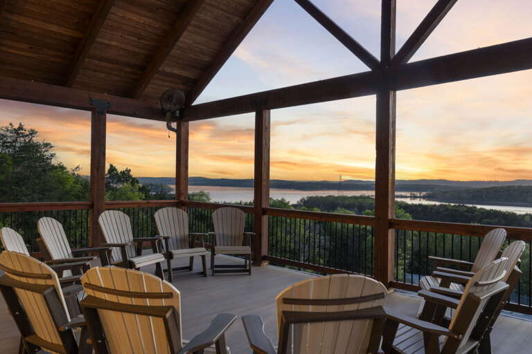 Lake View From Screened Patio With Chairs At Sunset