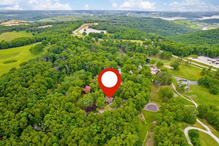 Aerial View Of Countryside With Location Marker