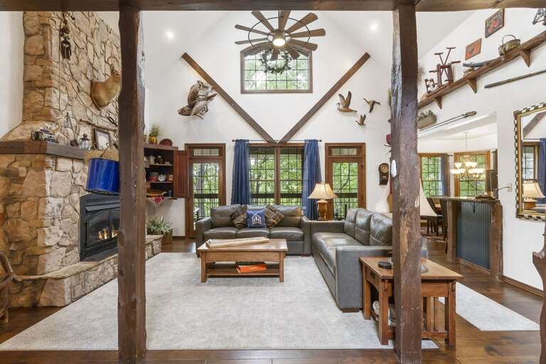 Rustic Living Room Interior With Fireplace And Wooden Beams Rustic Living Room Interior With Fireplace And Wooden Beams