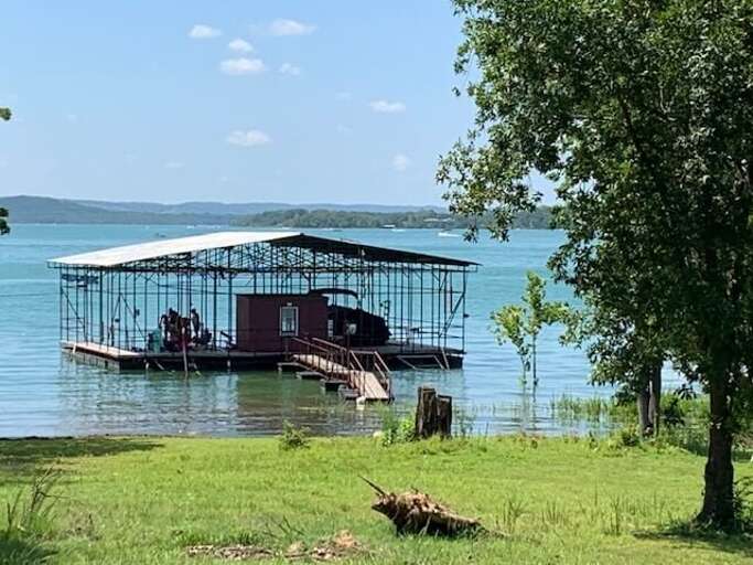 Community dock for fishing and swimming, boat slips are not available.