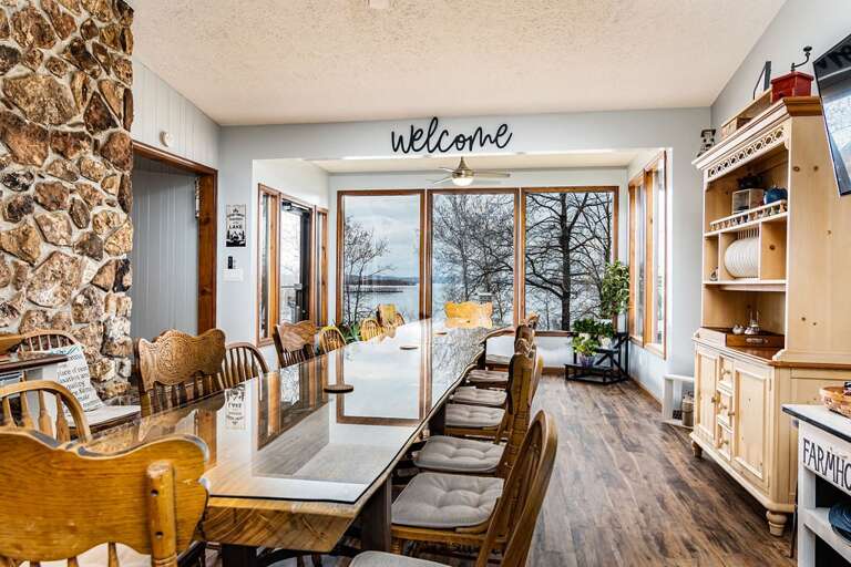 Plenty of dining space with an up close lake view!! Plenty of dining space with an up close lake view!!