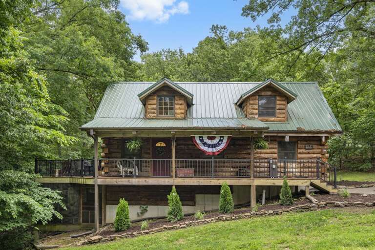 Rustic Cabin In Forest Setting