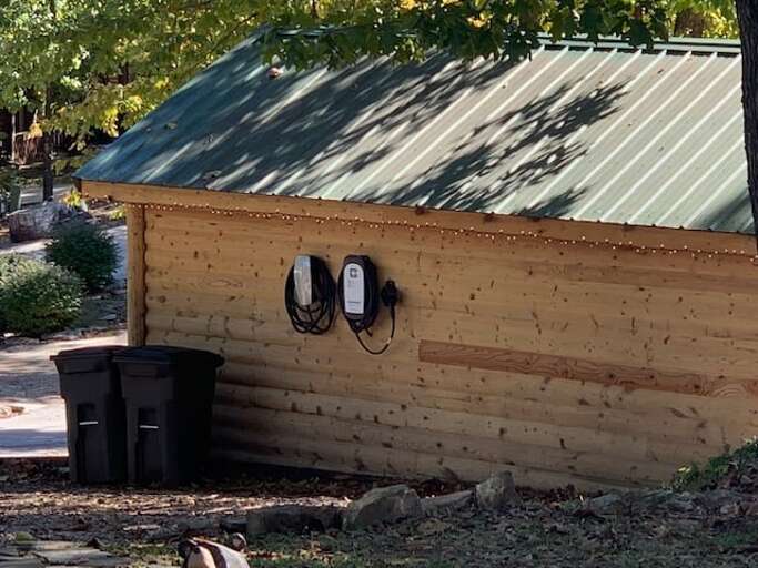 Tesla or Universal Electric Car charger is right at Three Bear Lodge for your use Tesla or Universal Electric Car charger is right at Three Bear Lodge for your use