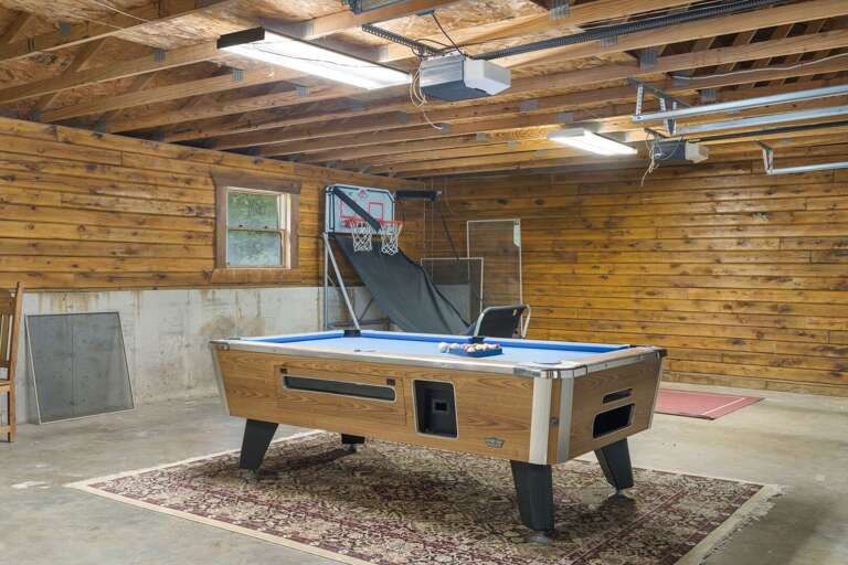 Basement With Billiards Table, Basketball Hoop, Wooden Walls Basement With Billiards Table, Basketball Hoop, Wooden Walls