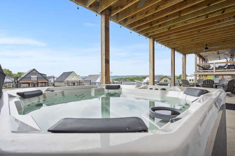 Outdoor Hot Tub On Deck With Overhead Pergola And Scenic View