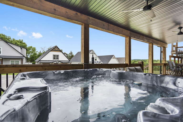 Outdoor Jacuzzi On Covered Patio With Neighborhood View