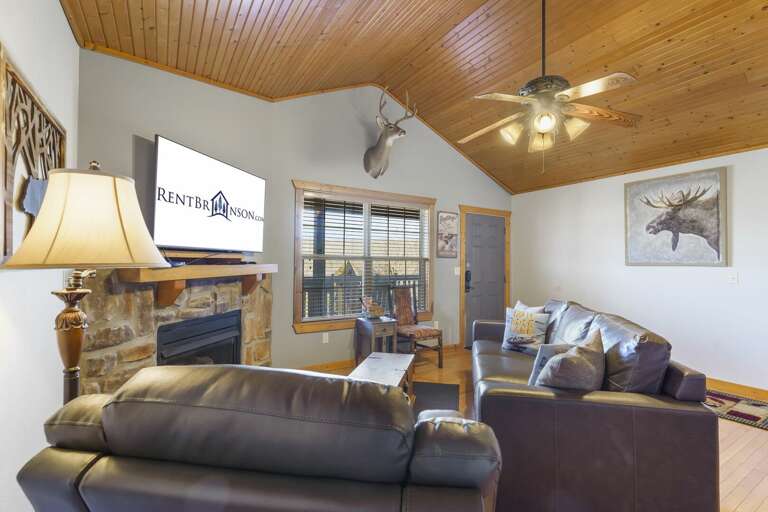 Living Room Interior With Furniture And Fireplace, Labeled As Vacation Rental
