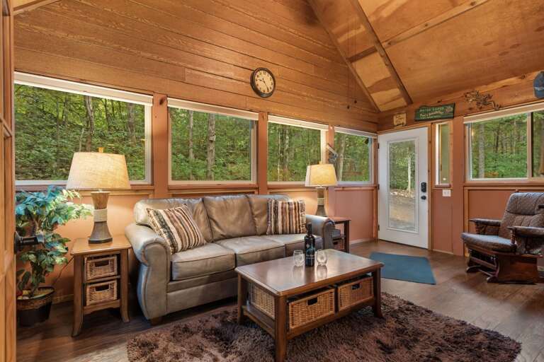 Rustic Living Room Interior With Forest View Through Windows Rustic Living Room Interior With Forest View Through Windows