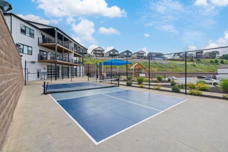 Pickelball Court Poised By Pristine Vacation Rental Properties