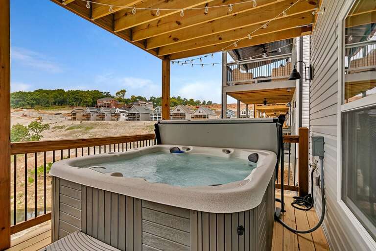Outdoor Deck With Hot Tub And Scenic View At Vacation Rental Outdoor Deck With Hot Tub And Scenic View At Vacation Rental