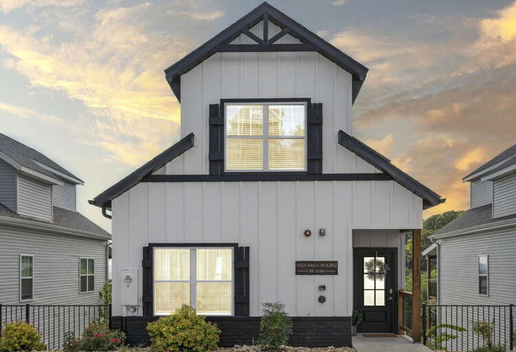 Two-story Residential House At Dusk