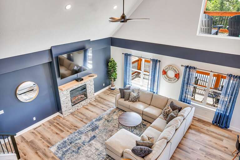 Interior Living Room With Sectional Sofa And Fireplace