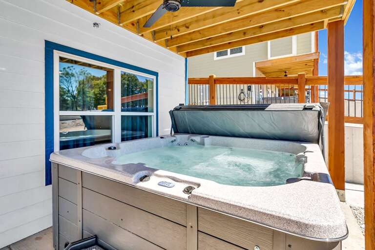 Outdoor Space With Hot Tub Under A Pergola