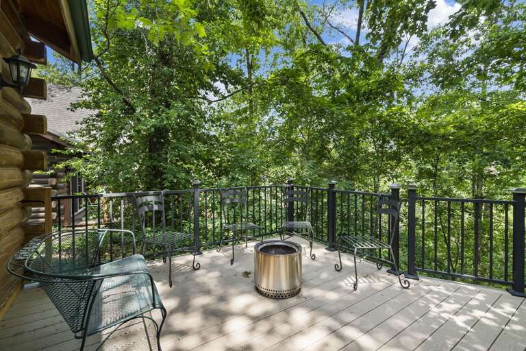 Outdoor Deck With Furniture And Green Foliage Outdoor Deck With Furniture And Green Foliage
