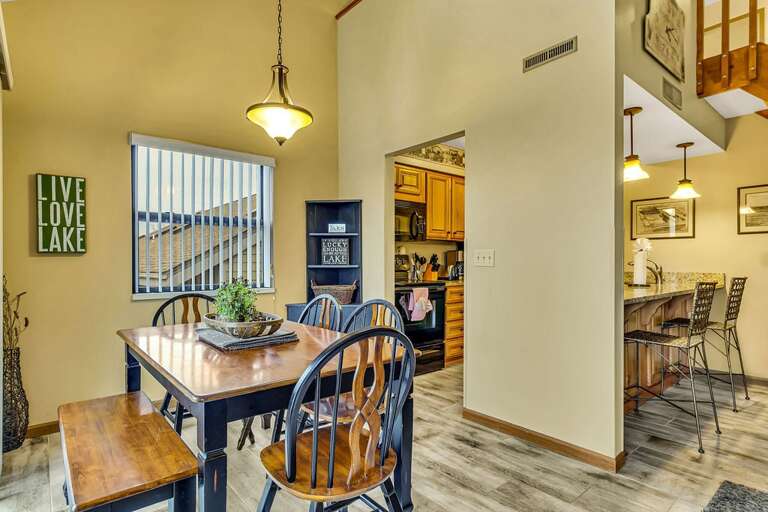 Interior Of A Vacation Rental Dining Area Leading To Kitchen Interior Of A Vacation Rental Dining Area Leading To Kitchen