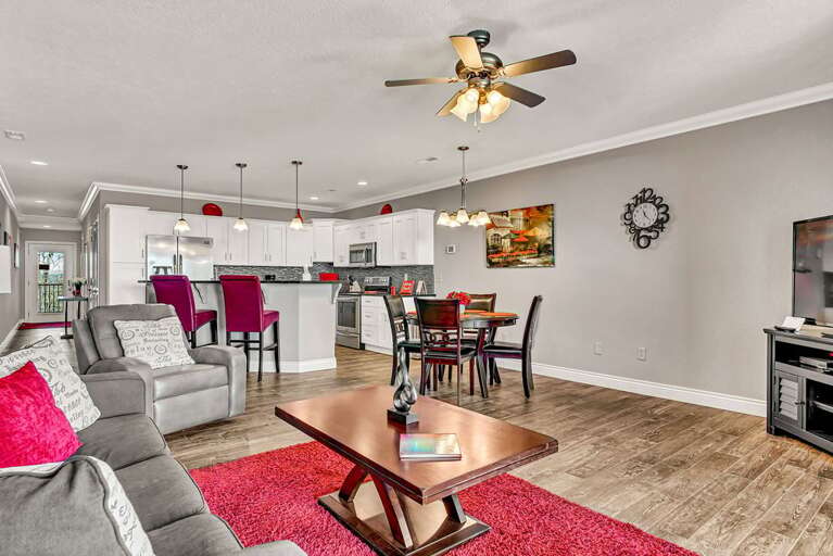 Interior Living Space With Kitchen, Dining And Seating Areas