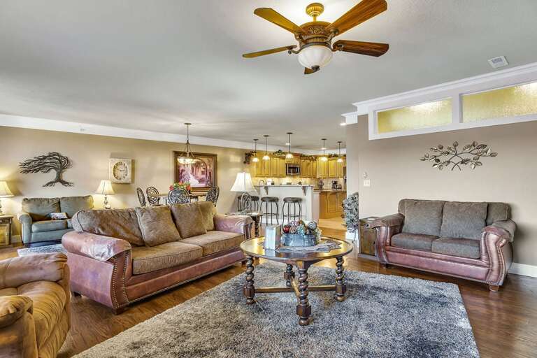 Living Room Interior With Sofas And Kitchen In The Background