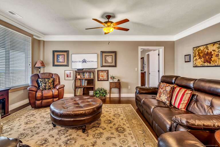 Residential Living Room With Furniture And Ceiling Fan