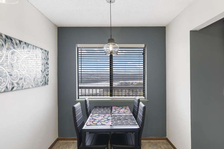 Dining Area With Table, Chairs, And Pendant Light Dining Area With Table, Chairs, And Pendant Light