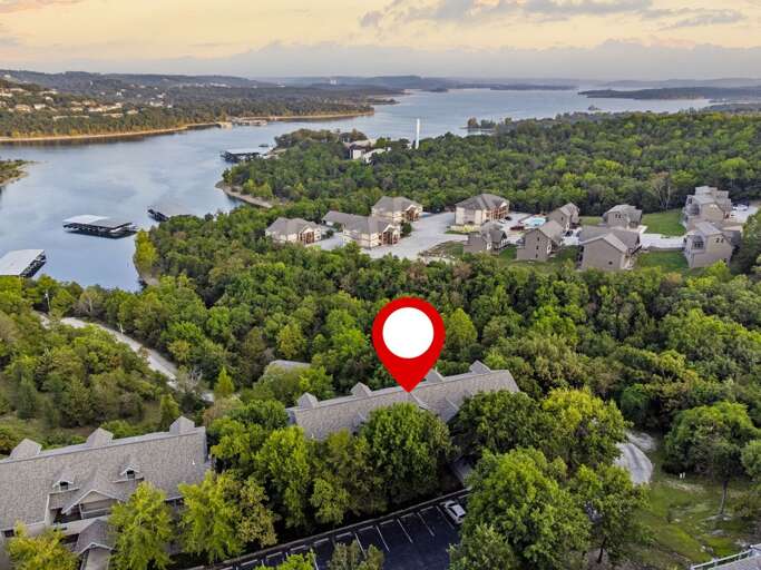 Aerial View Of Lakeside Residential Area With Location Marker