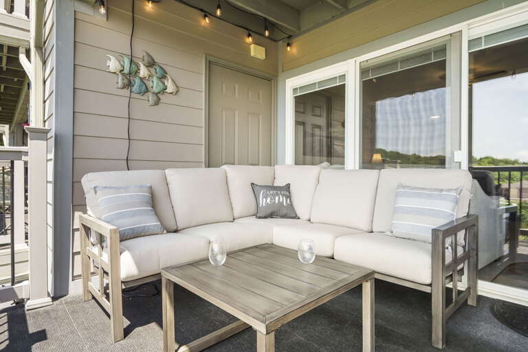 Balcony Seating Area With Sofa And Table
