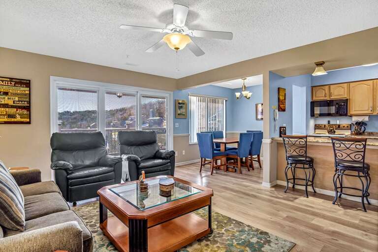 Living Room With Furniture Leading To Kitchen Area Living Room With Furniture Leading To Kitchen Area