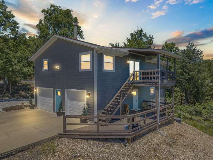 Two-story Vacation Rental With Balconies At Twilight