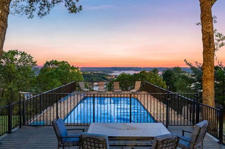 Swimming Pool Overlooking Scenic Sunset View