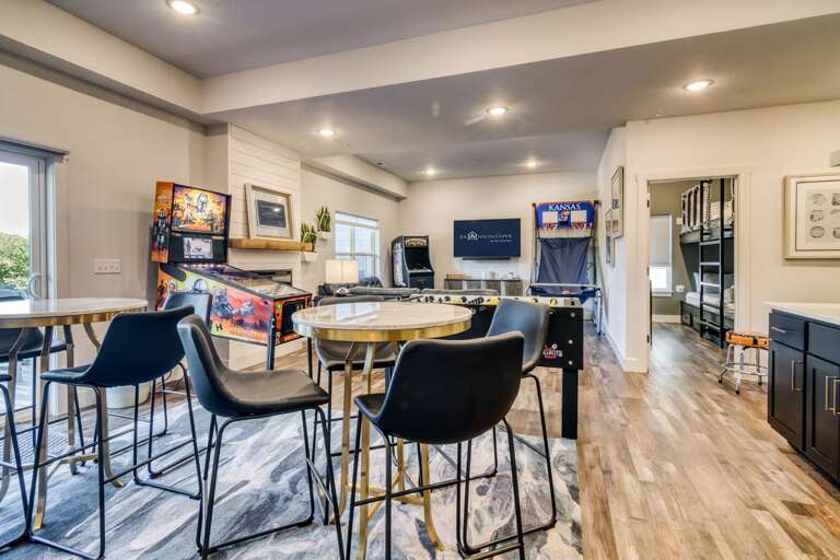 Residential Interior With Dining Table, Chairs, And Kitchen