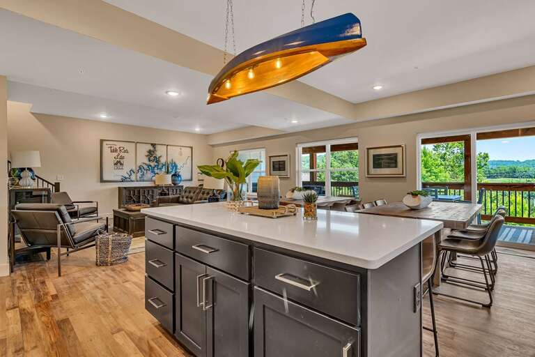 Interior Of Vacation Rental With Kitchen Island And Dining Area