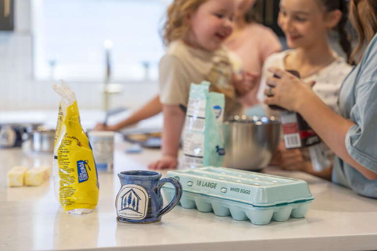 Family Enjoys Kitchen Cooking Session