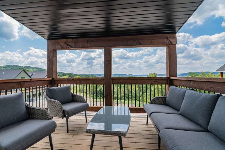 Outdoor Seating Area Of A Vacation Rental With Landscape View