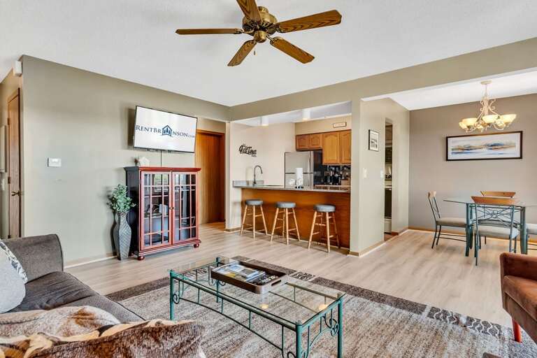 Living Room Interior With Kitchenette And Dining Area In Vacation Rental Living Room Interior With Kitchenette And Dining Area In Vacation Rental