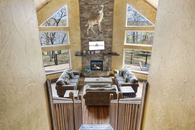 Vacation Rental View: Vaulted Venue With Vibrant Vistas, Visible Deer Decals, And Distinctive Decorative Details