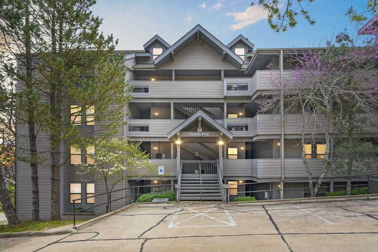 Multi-story Vacation Rental Building With Parking Lot