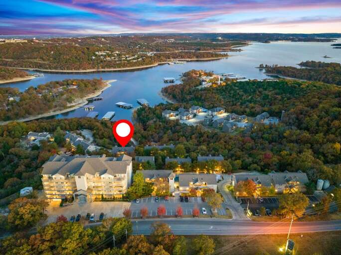 Aerial View Of Lakeside Vacation Rental At Twilight