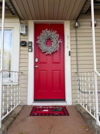 Red Door With Wreath, White Railing, Vacation Rental Entry