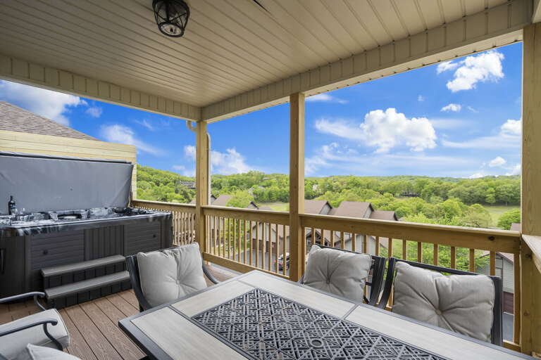 Outdoor Patio With Seating And Grill Overlooking Nature