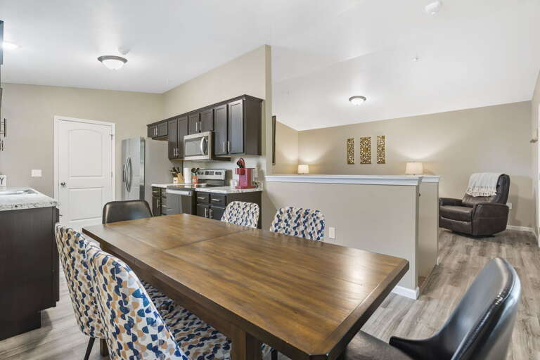 Interior Of A Vacation Rental Living Space With Kitchen And Dining Area
