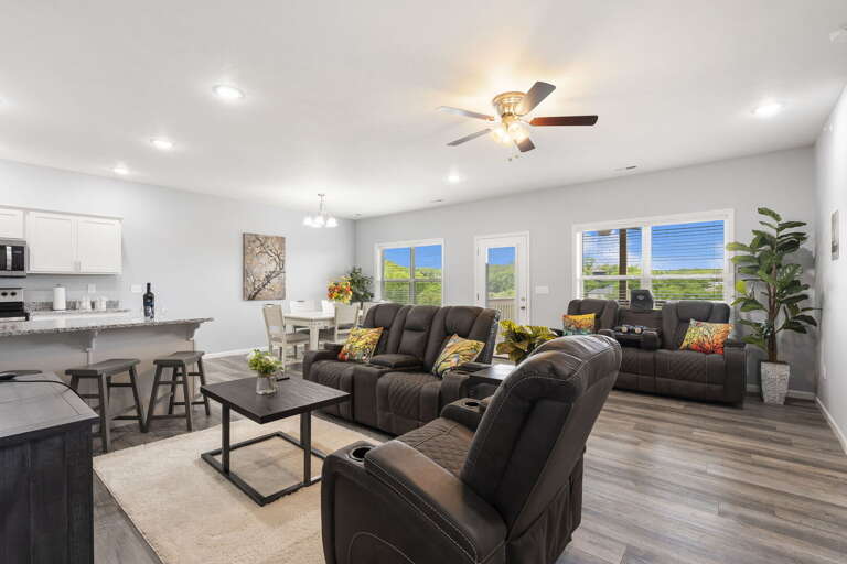 Interior Of A Vacation Rental Living Space With Kitchen And Seating Area Interior Of A Vacation Rental Living Space With Kitchen And Seating Area