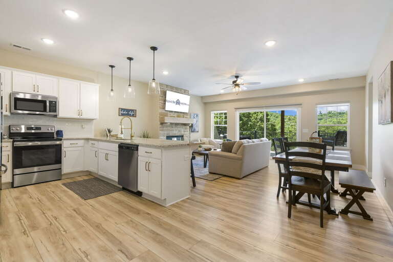 Interior View Of A Vacation Rental With Kitchen And Living Area