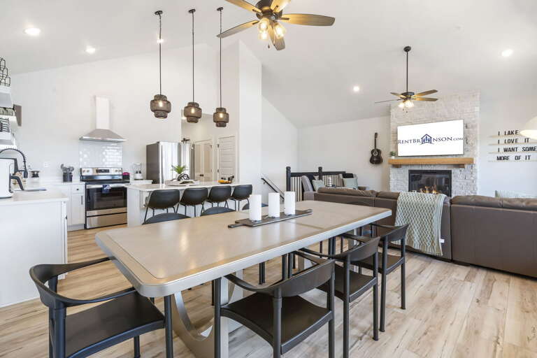 Interior Of A Kitchen And Dining Area With Table And Chairs