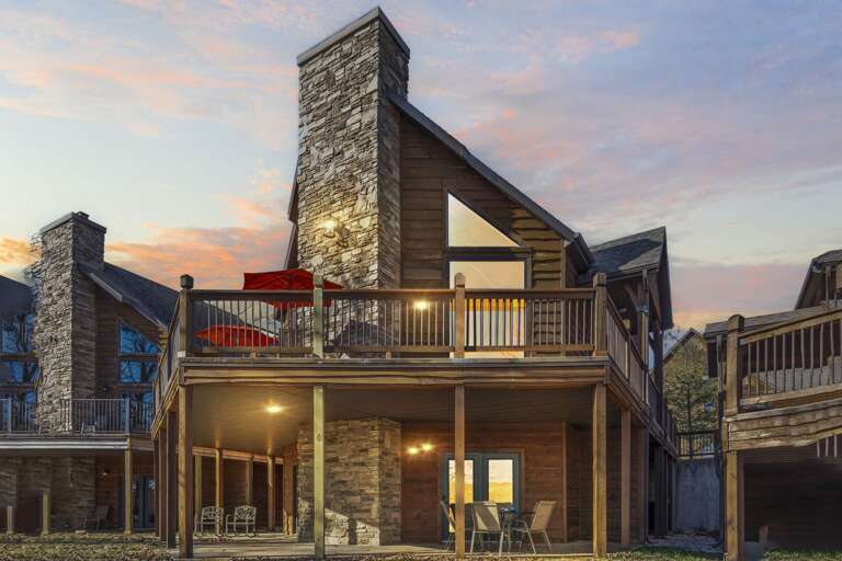 Exterior Of A Stone-built Vacation Rental At Dusk