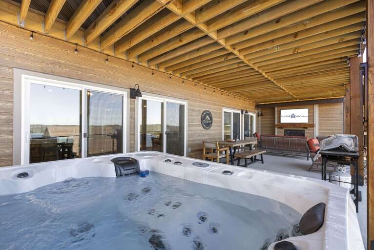 Balcony With Hot Tub And Seating Area