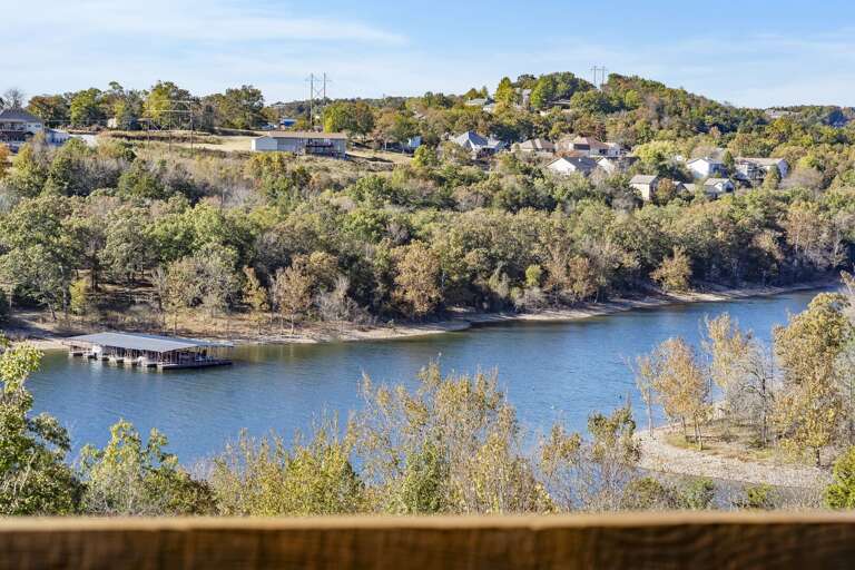 River Landscape With Residential Area And Trees River Landscape With Residential Area And Trees