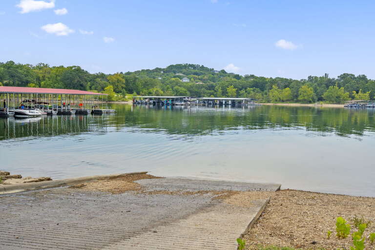 Lakeside Leisure Locale, Serene Scene With Docked Boats And Reflective Water