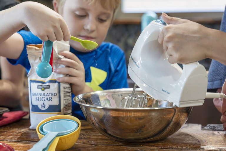 Child Pouring Sugar, Adult Adding Water, Baking Bowl Session Child Pouring Sugar, Adult Adding Water, Baking Bowl Session