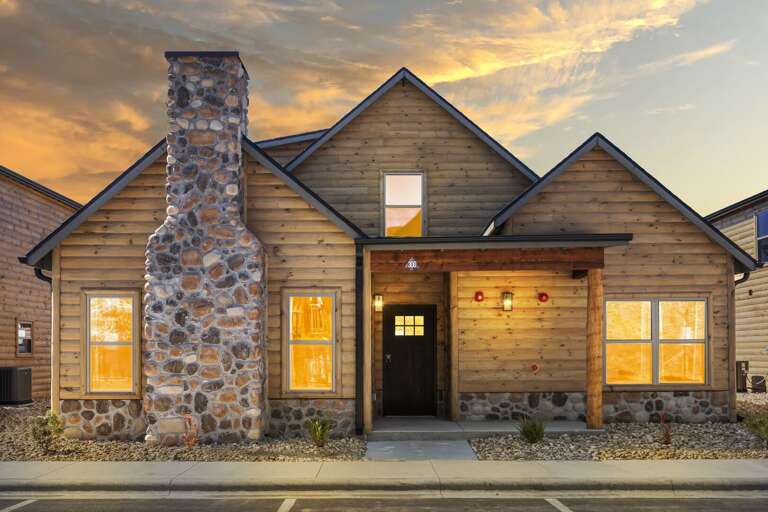 Wooden Residential House At Sunset