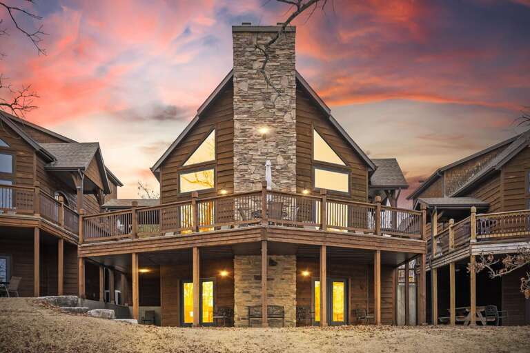 Two-story Building With Balconies At Sunset